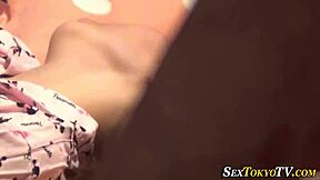 SPIED on asian babe as she RUBS her small tits