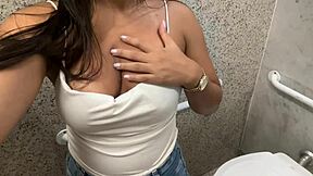 I couldn't hold back my horniness so I'm masturbating in the shopping mall bathroom right now