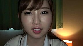 Japanese teen in uniform teases with panty flashes and delivers intense handjob action