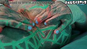 Skinny tattooed goth girl uses dildos for solo anal play in doggystyle