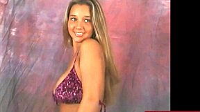 busty christina dances in a purple bikini