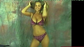 busty christina dances in a purple bikini