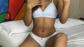 Hey, check out this innocent petite 18+ girl filming her solo play on her phone while being spied on.