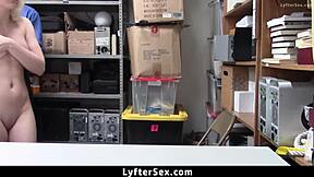 loss prevention officer handles the situation with a caught teen shoplifter in the office at work