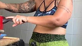 uhh i think this married woman records cooking videos but really she's just flashing her swollen pussy everywhere