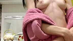 Raven-haired petite chick rubs and fucks her tight shaved pussy with toys in kitchen solo 😘🍆