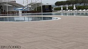 Latex flexi doll stretches in catsuit for outdoor fetish fun