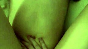 small teen 18+ starts her day with some light stretching exercises in a quiet room. she focuses on flexibility, using simple poses to loosen up her skinny frame gradually.