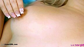 hey, check out this graceful golden blonde showing off her sexy body during a photoshoot on the sofa - she's petite and hot!