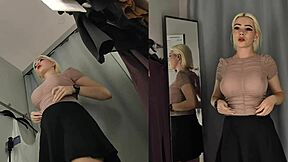 I spy upskirt on naked blonde with big tits trying see-through clothes in changing room.