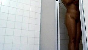 real couple enjoys wet bathroom shower together at home.