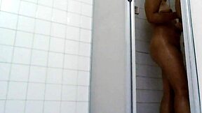 real couple enjoys wet bathroom shower together at home.