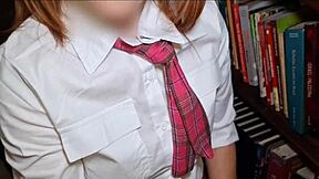 redhead gets caught giving blowjob in school library