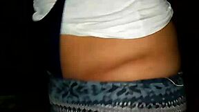 Lydia appears innocent in her teen style. She poses casually wearing a simple tanguita outfit for the scene.