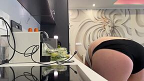 Blonde wife in kitchen teases with sheer black pantyhose and removes panties?