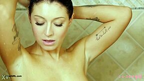 brunette fashion model steps into steamy shower after photoshoot