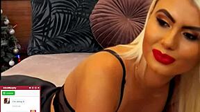 that blonde whore moans loud while fingering her shaved pussy on cam