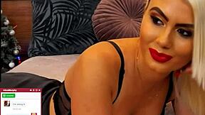 that blonde whore moans loud while fingering her shaved pussy on cam