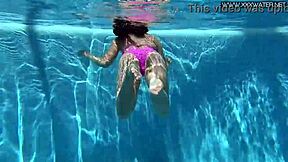 Does Jessica Lincoln's Pink Bikini Tease Underwater Pool Secrets?