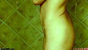 elegant blonde teen steps into shower after classy photoshoot interview