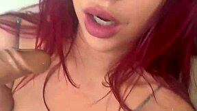 petite redhead lesbian rides huge dildo in solo fantasy