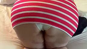 Petite girl teases her panty lines slow and seductive in bedroom play