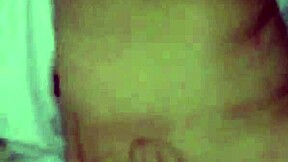 A young couple enjoys intimate bedroom moments together.