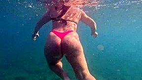 pawg shakes big ass in thong bikini underwater swim.