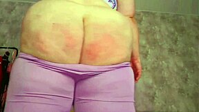 Redhead BBW spanks bare fat ass 100 times on webcam