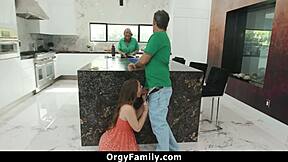 stepdaughter sneaks blowjob on daddy's cock behind kitchen counter during stepmom's orgyfamily chaos